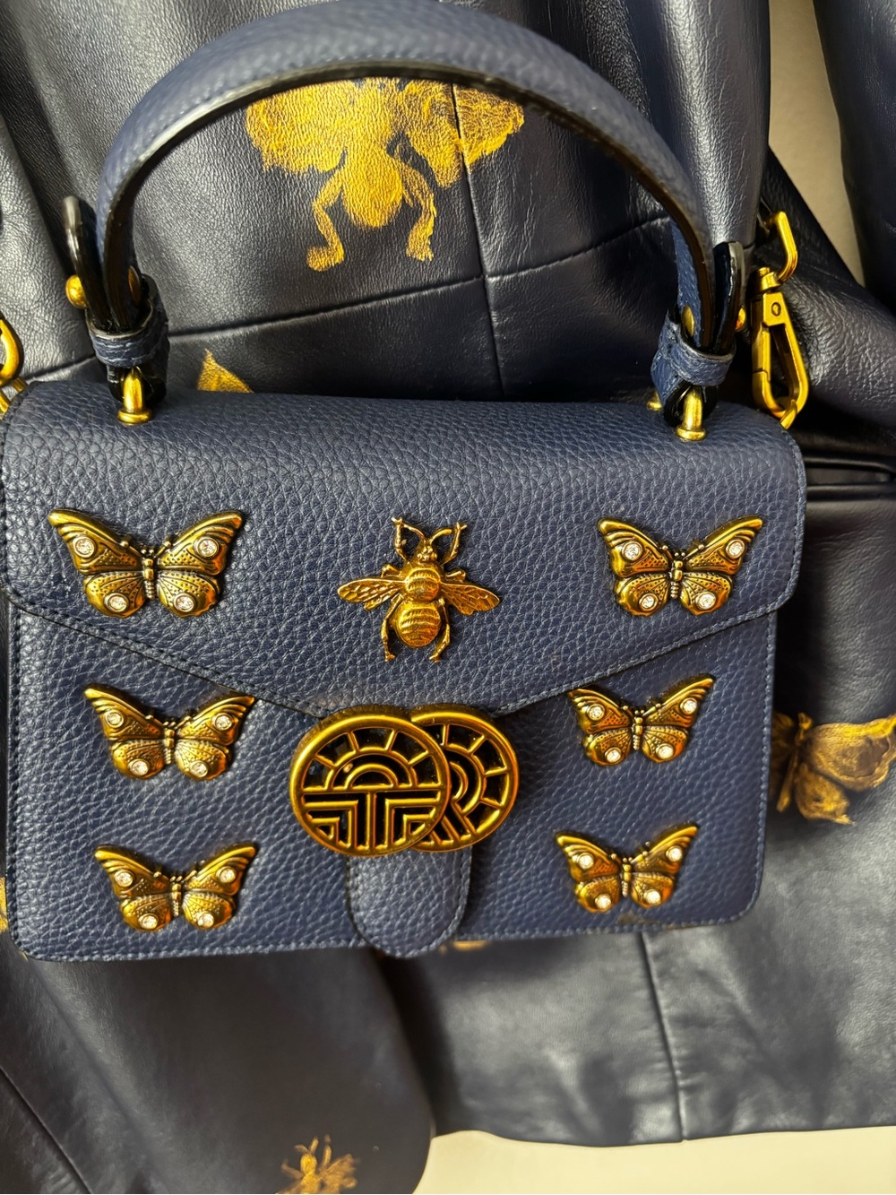 Louis Feraud purse and Blue Leather Blazer with Gold Butterfly Accents